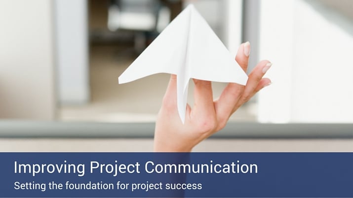 A blue banner that says "improving project communication" against the background of a white paper plane.